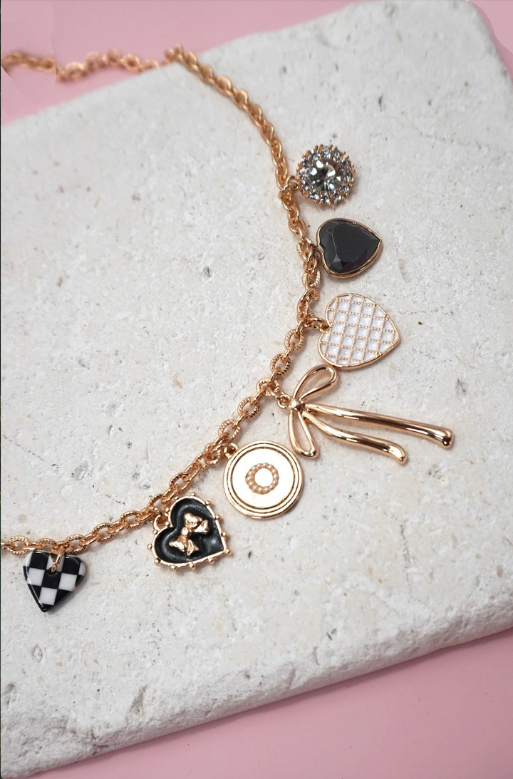 Petra Tarnish Free Charm Necklace with Bow, Checker, and Heart Rhinestone